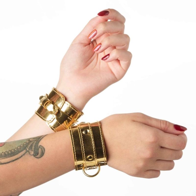 Наручники для БДСМ (без зчіпки) DS Fetish лаковане золото вид 2