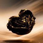 Свічка низькотемпературна у вигляді троянди з глітером GlowKink чорна, L вид 11