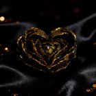 Свічка низькотемпературна у вигляді троянди з глітером GlowKink чорна, L вид 28