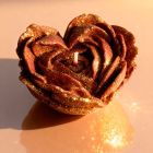 Свічка низькотемпературна у вигляді троянди з глітером GlowKink бордова, L вид 53