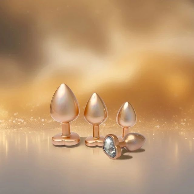 Набір із трьох анальних пробок Dream Toys Gleaming Love, розміри S, M, L, перламутрово-золоті вид 6