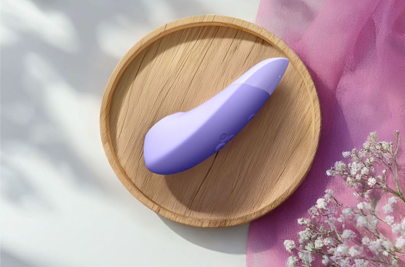 Клиторальный вакуумный стимулятор 2 в 1 Womanizer Enhance с вибрацией, сиреневый вид 9