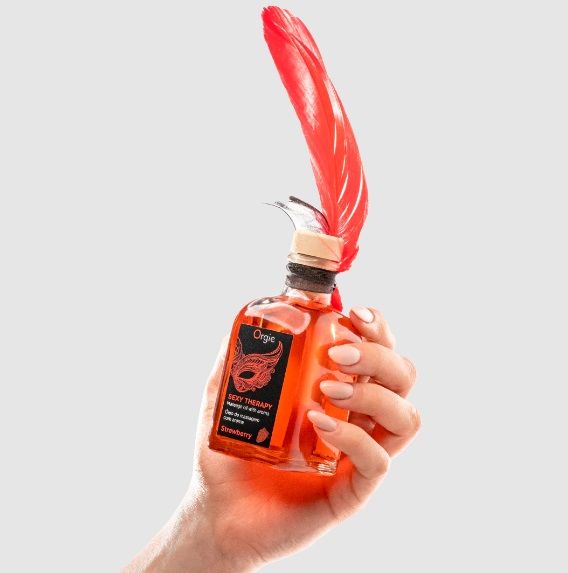 Набір Orgie SEXY THERAPY Strawberry: їстівна масажна олія зі смаком полуниці+перо вид 6
