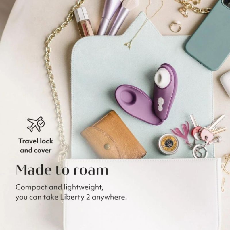 Вакуумный стимулятор клитора Womanizer Liberty 2 Dark Purple, фиолетовый вид 11